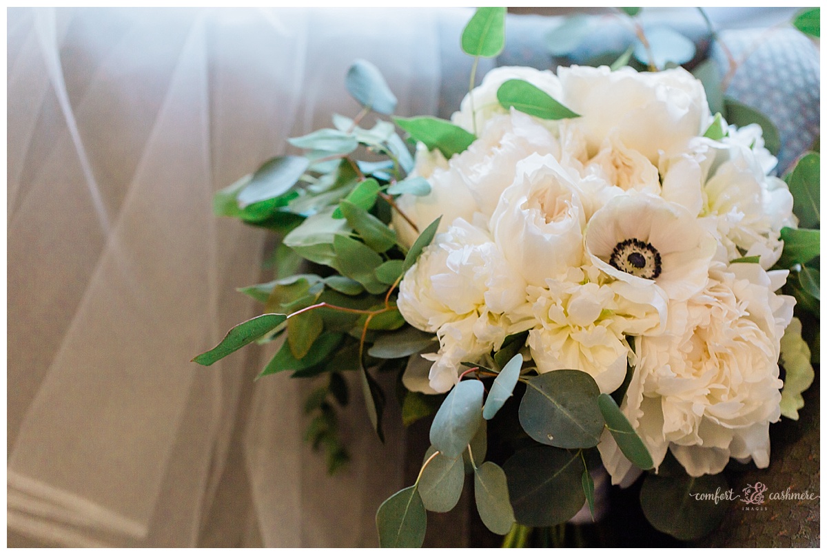 bridal bouquet from Saffron and Grey utilizing white florals and greens