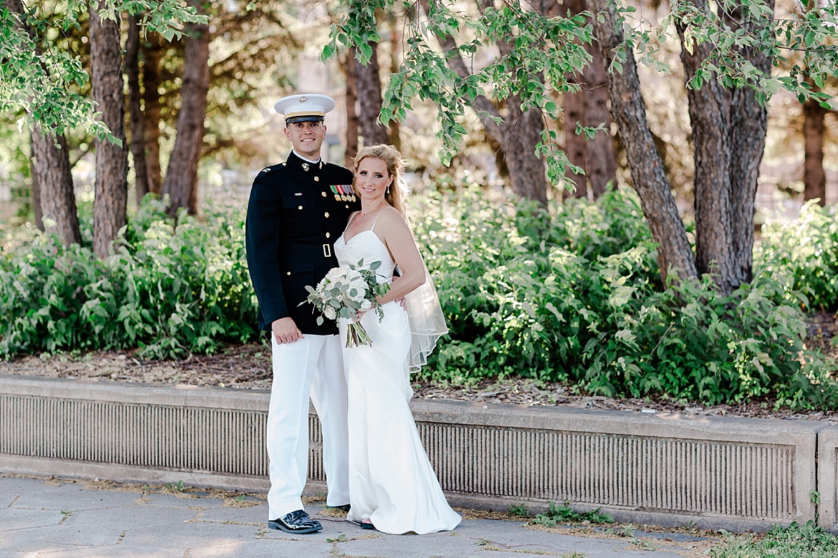 Greysolon Moorish Room wedding, couple standing in front of greenery 