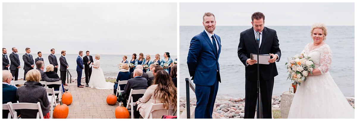 redheaded groom in a blue suit and gorgeous blonde smiling bride look at their guests during their wedding ceremony