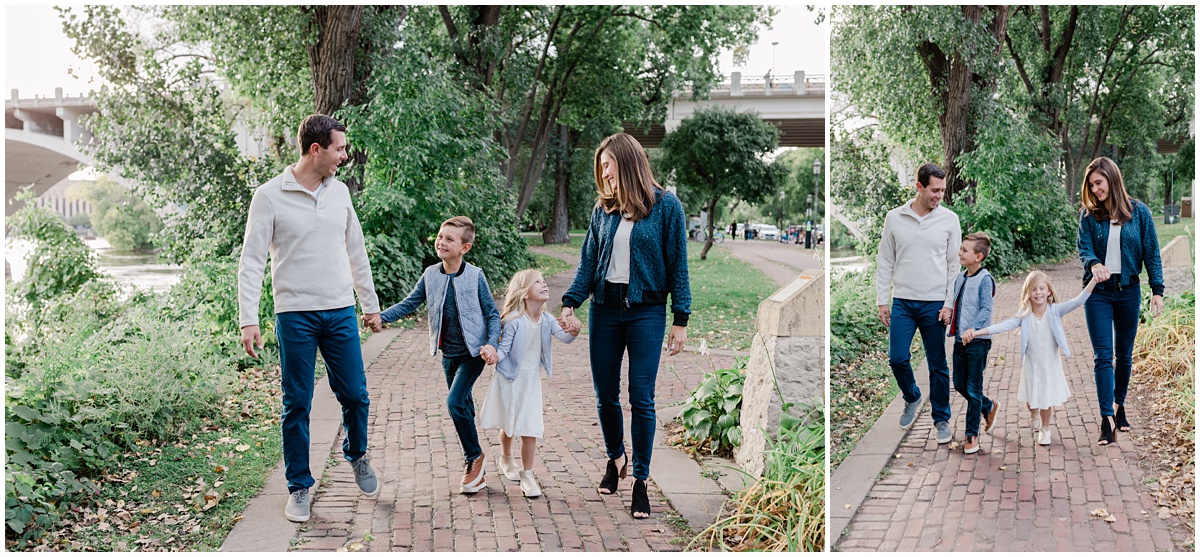 fun family lifestyle photos of a young mom and dad walking through a park with their six and eight-year old daughter and son