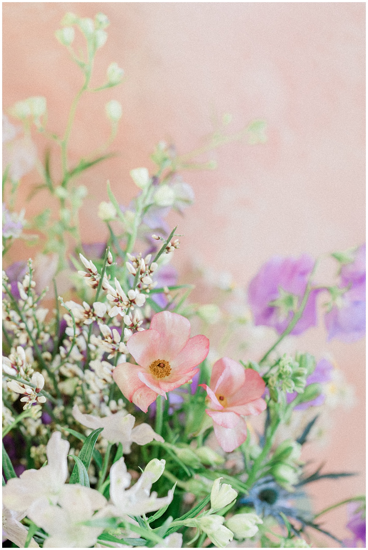 Stunning spring florals containing a mixed variety of colors and shades of pinks, purples, creams and burgundies.