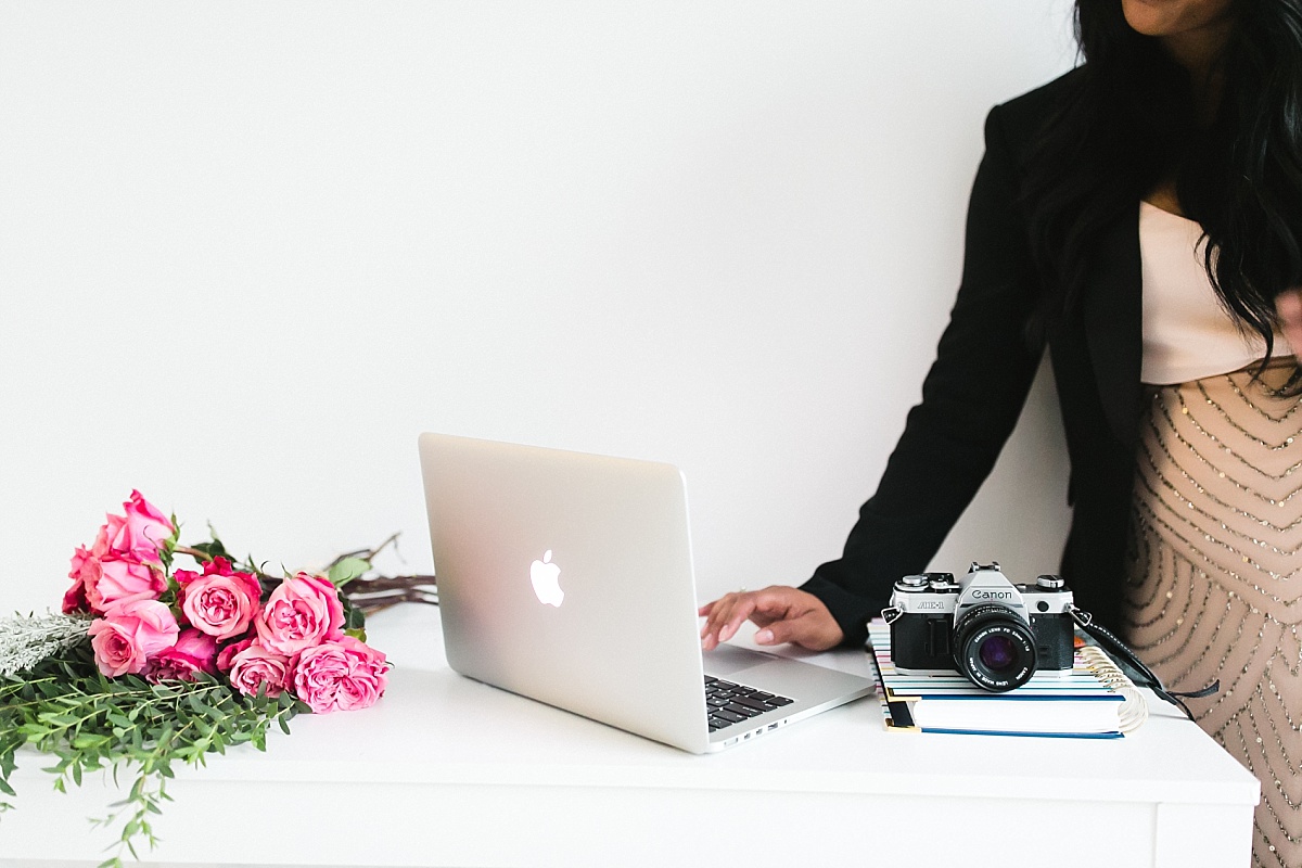 Photographer Rohana Olson of Comfort and Cashmere Images working from home on her macbook