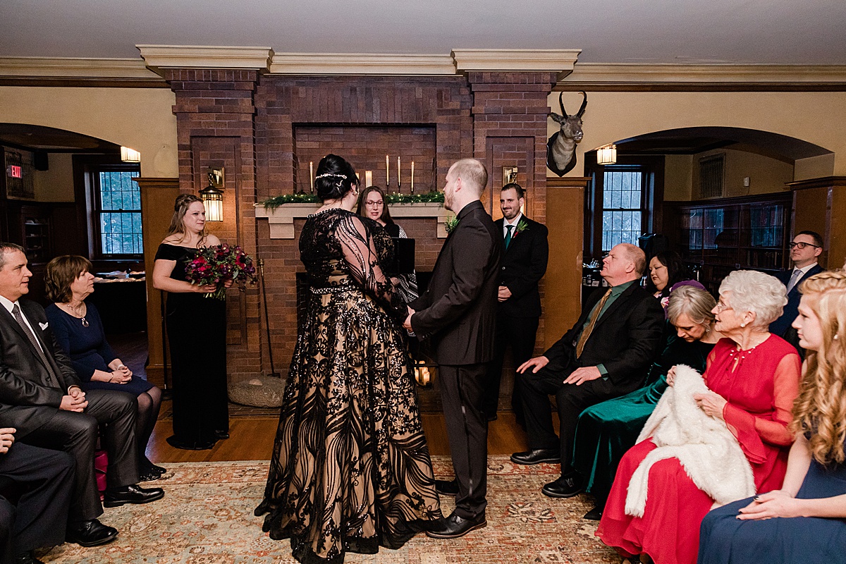 intimate wedding ceremony in the great room of the Glensheen Mansion in Duluth, Minnesota