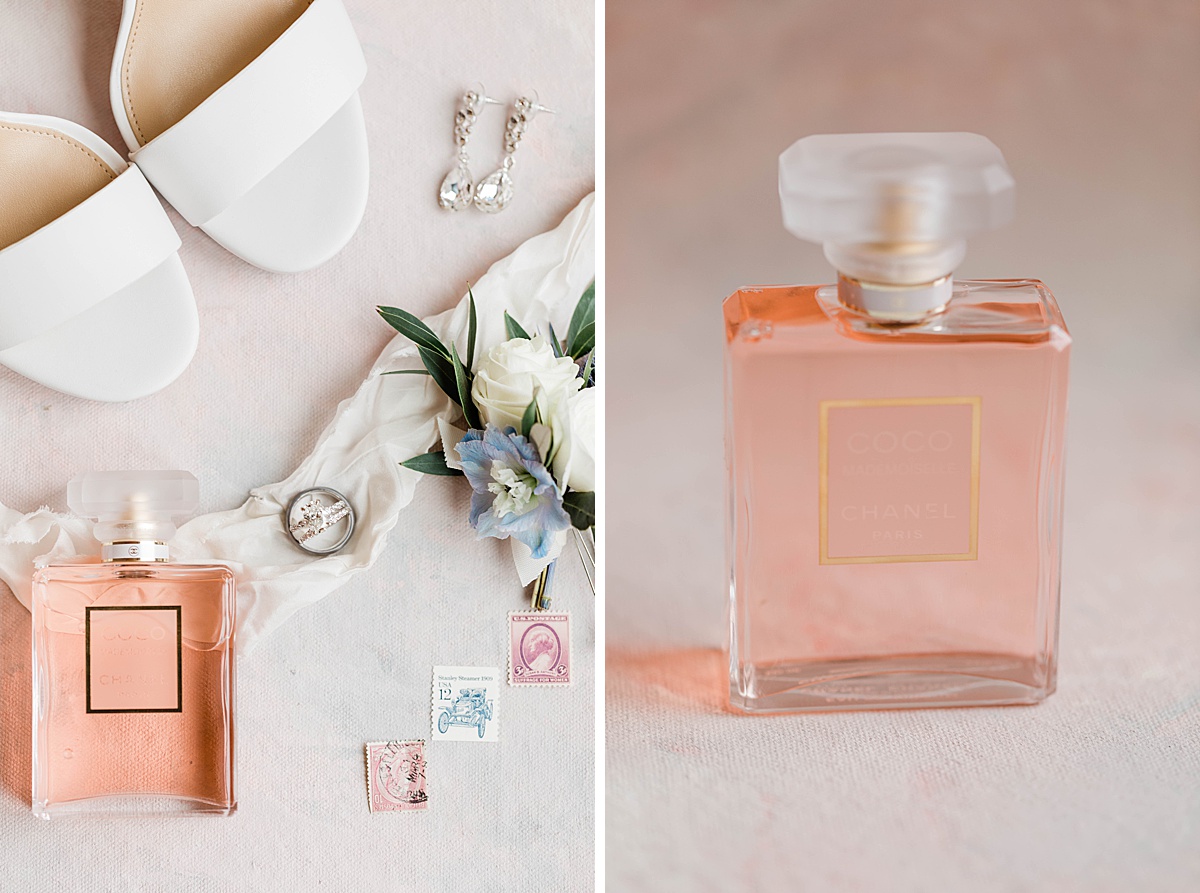 beautiful elopement detail shots by Comfort & Cashmere wedding photographer of a pair of Michael kors white heels, chanel perfume,wedding jewelry and boutonniere