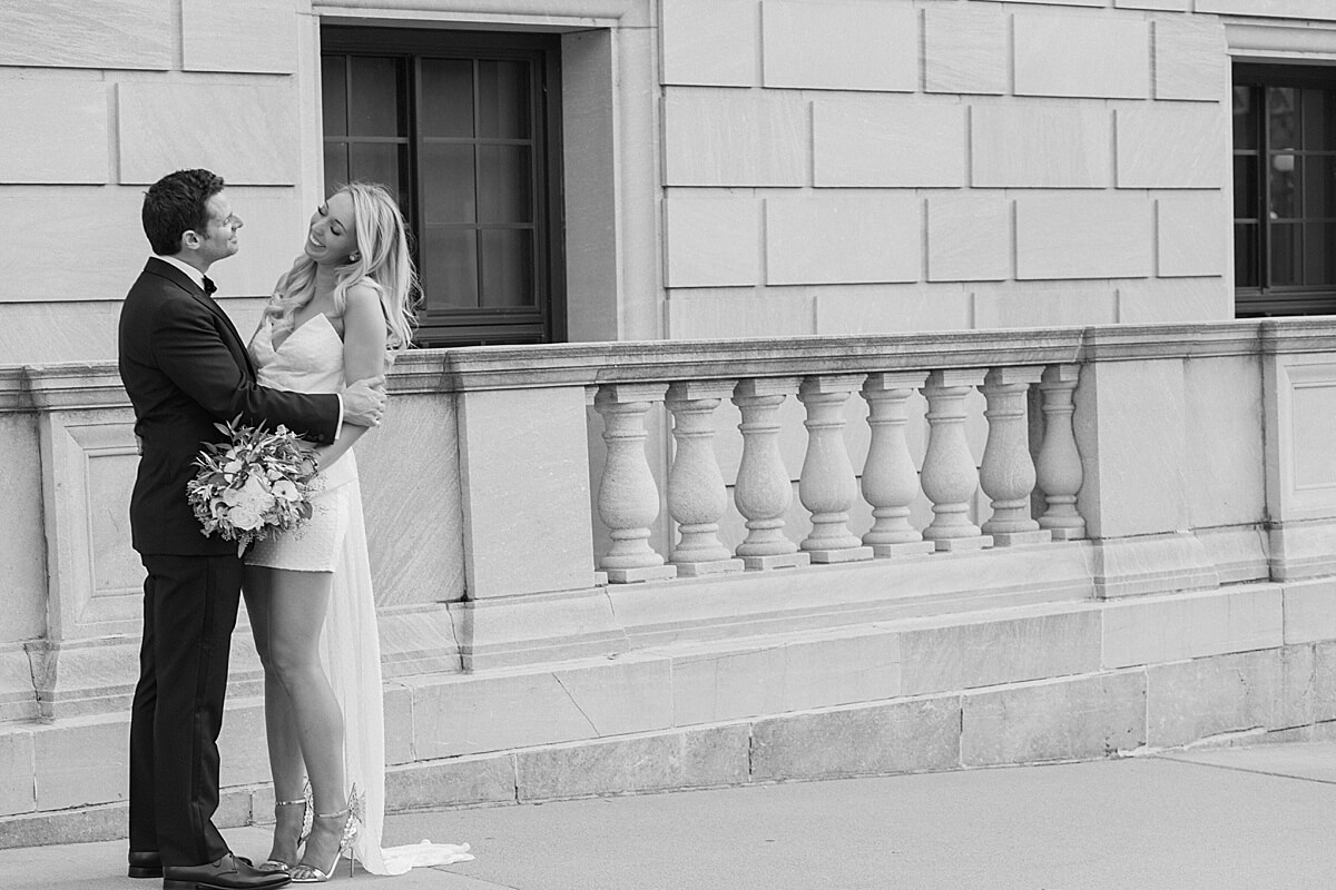 Bride and Groom in front of landmark center in downtown St Paul 