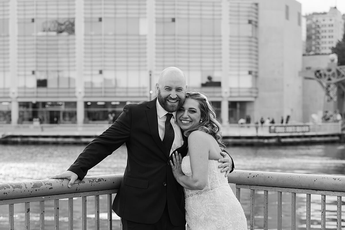 bride and groom portraits near lake superior in canal park