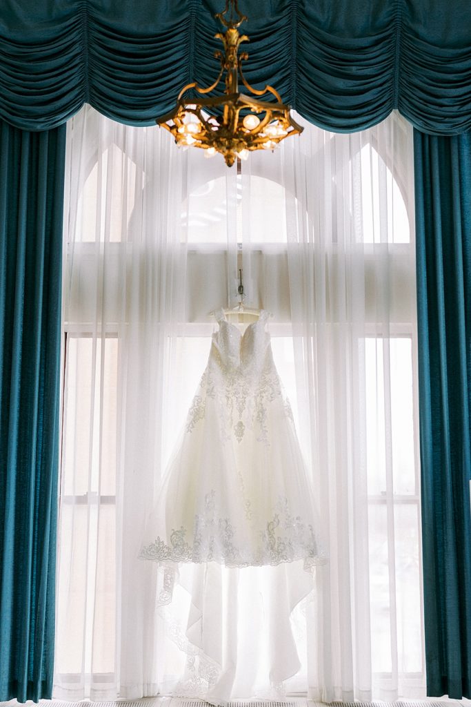 wedding dress hanging in greysolon ballroom getting ready area