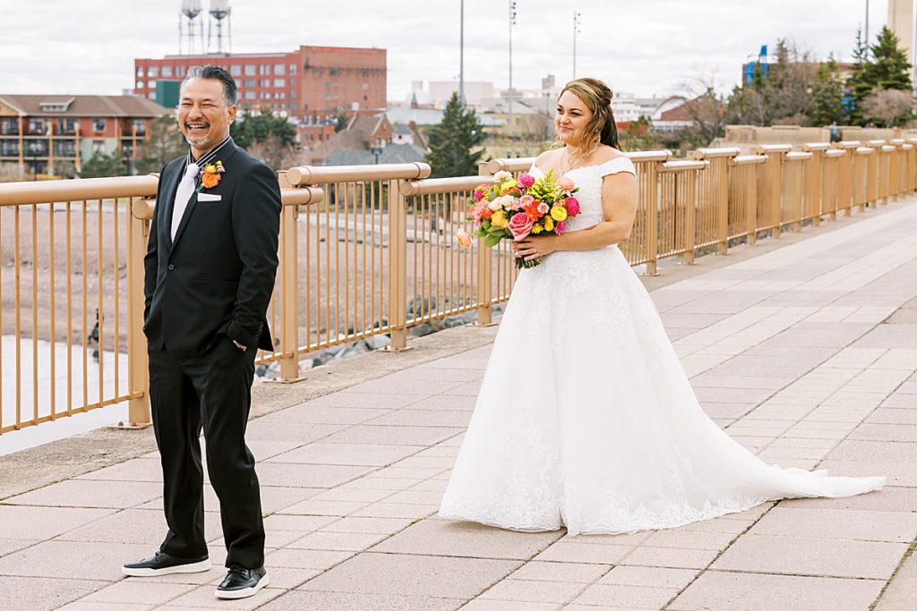 bride and groom first look for their Greysolon ballroom wedding in Duluth